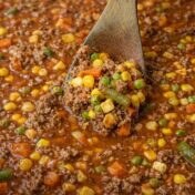 Homemade vegetable beef soup with tender chuck and root vegetables in a rustic bowl