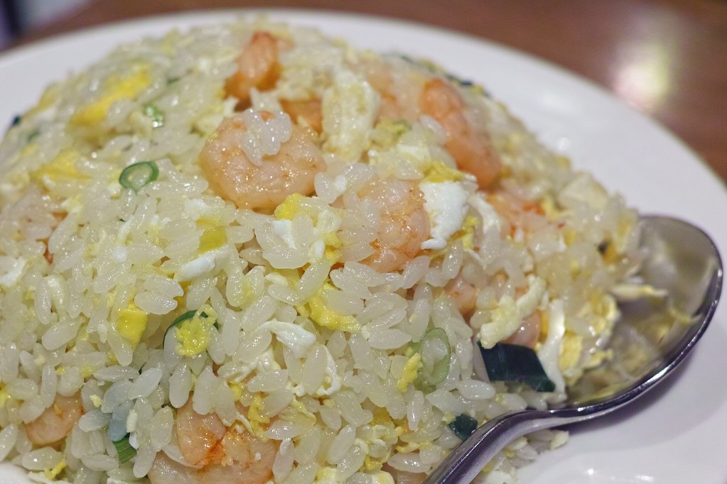 Close-up of pale Cantonese-style shrimp fried rice with egg and scallions at Din Tai Fung in Taipei